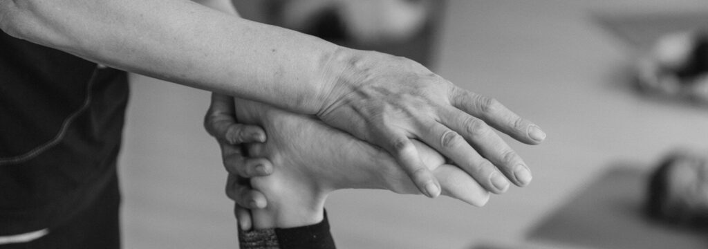 a close-up of a person's hands shaking